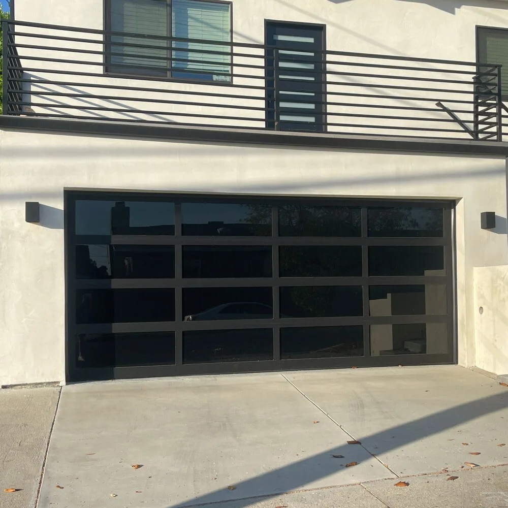 Full-view black frame garage door with black laminate glass