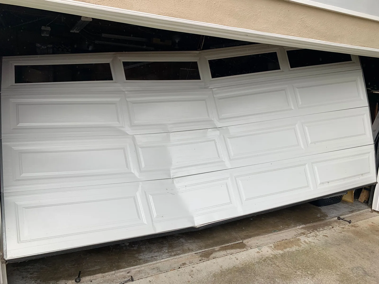 Off-track garage door repair